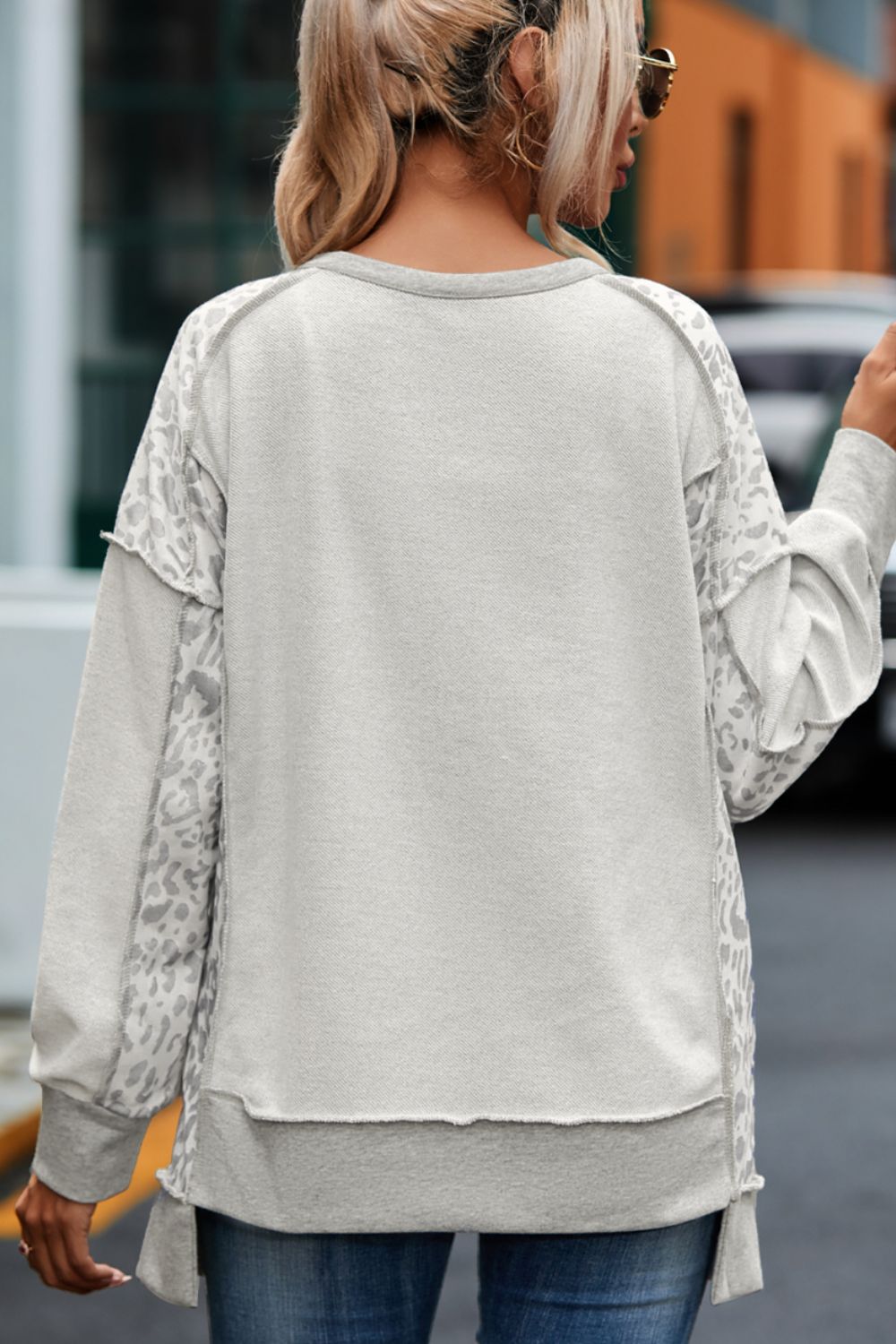 Exposed Seam Leopard Long Sleeve Sweatshirt Trendsi