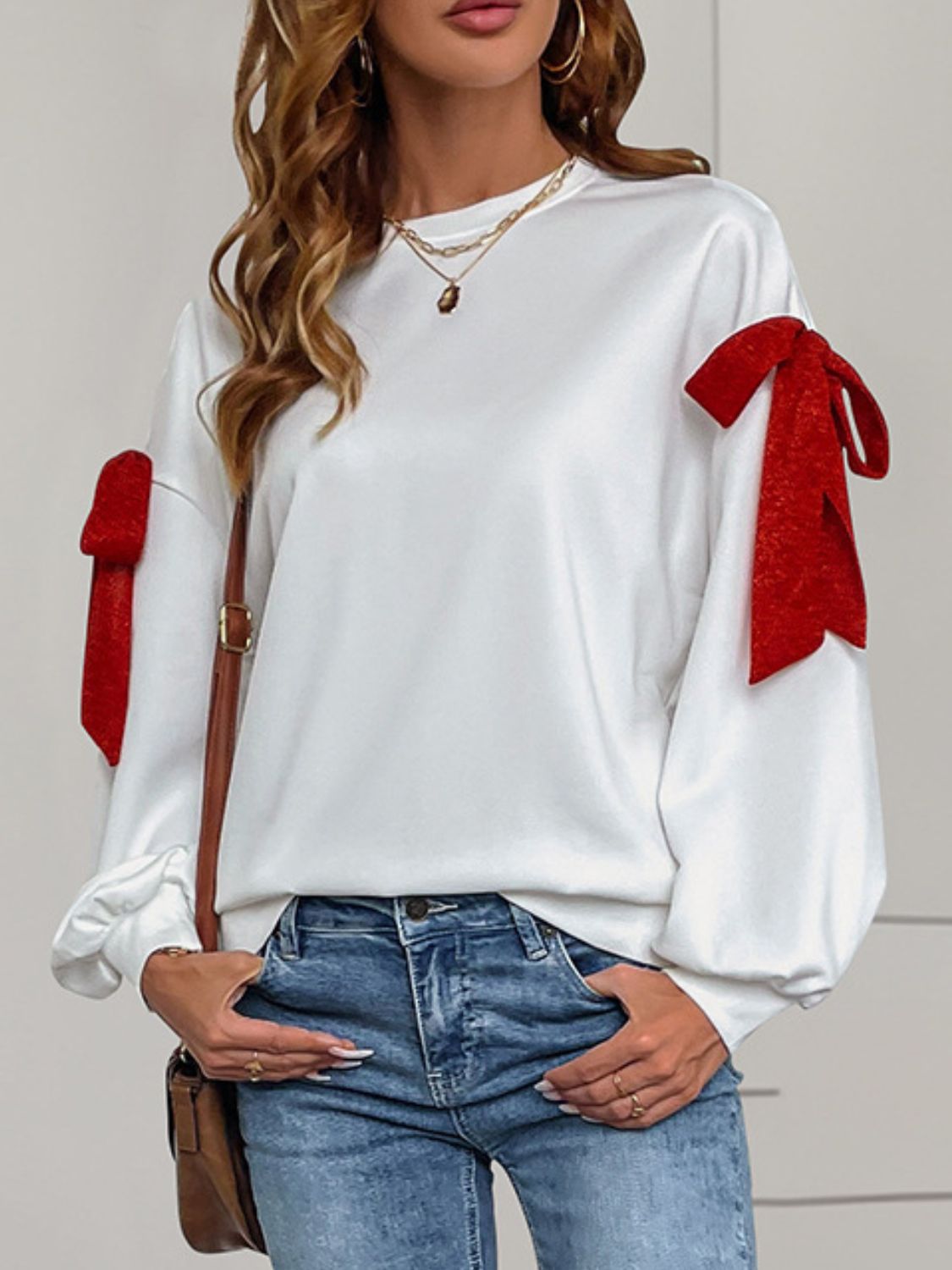 Perfee Bow Round Neck Long Sleeve Sweatshirt Trendsi