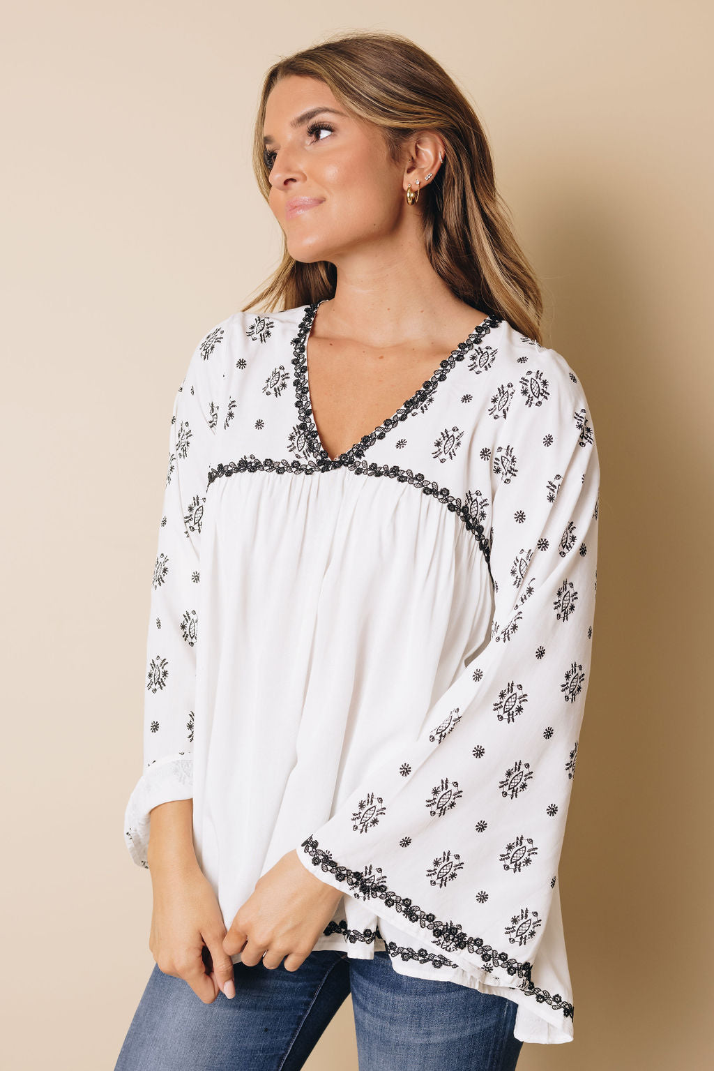 Skylee Embroidered Top Stay Warm in Style